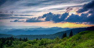 sun is setting on the Blue Ridge Parkway near Waynesville